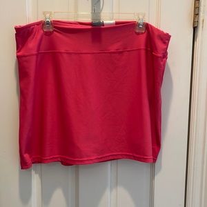 Nike pink tennis skirt with built in shorts. 16 inches in length.